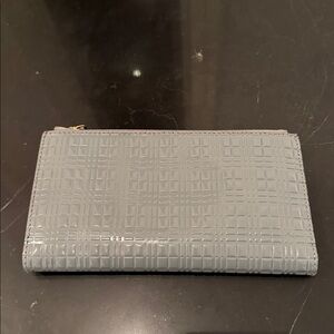 Burberry Grey Leather and patent Leather wallet in pristine condition